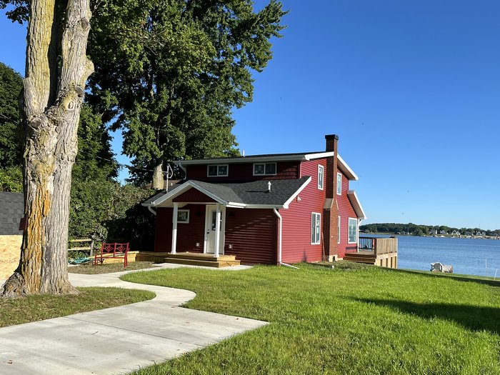 The red cottage beside Crystal Lake